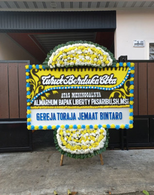 Papan Bunga Duka di Pulau Terung